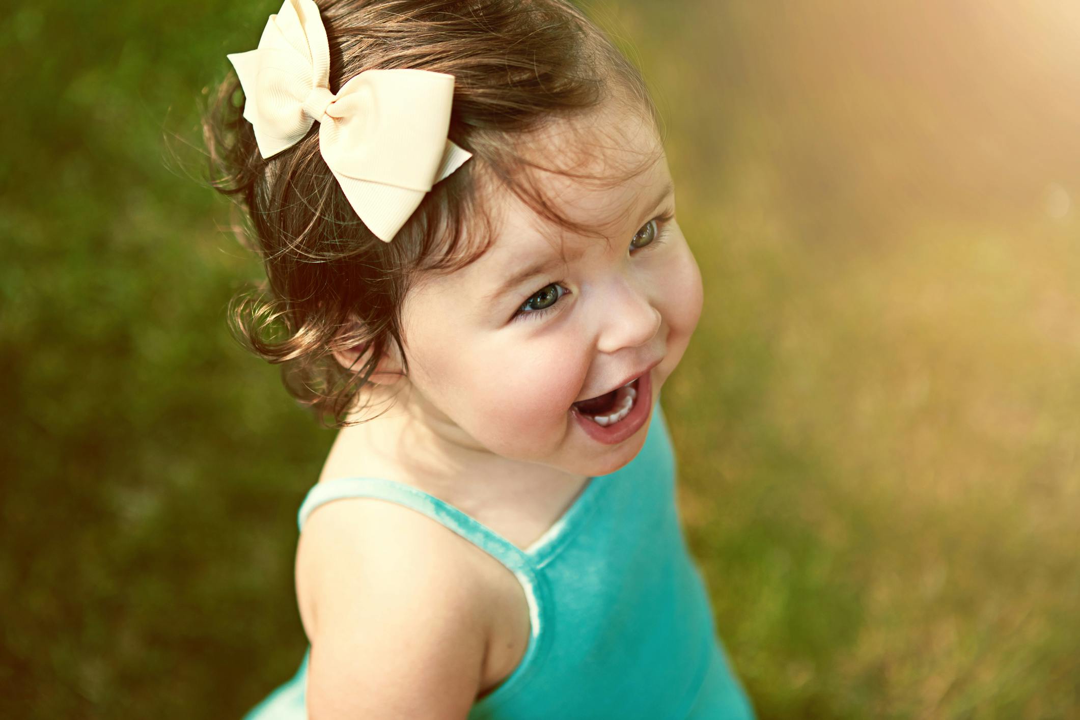 Cute girl smiling bow.jpg?ixlib=rails 3.0